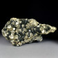 Mineralien sammeln Pyrit Kristalle mit Hämatit aus Elba